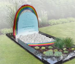 Grafmonument met regenboog van glas