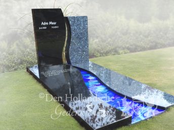 Grafmonument met blauw glas