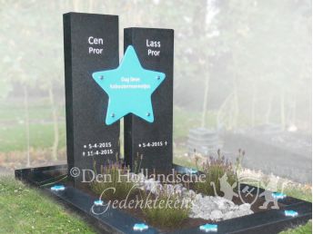 Kindergrafmonument met sterren van glas